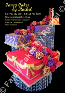 596-PurpleRedDamaskweddingcakeoncrystalstands-15eaab29509a35