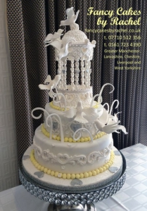 gazeboanddovesweddingcakelemonandsilver-159a3d20db18ea