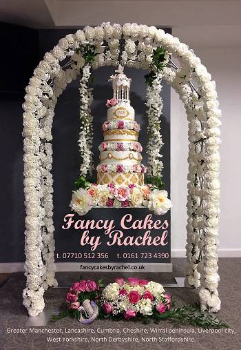 floral arch swing wedding cake